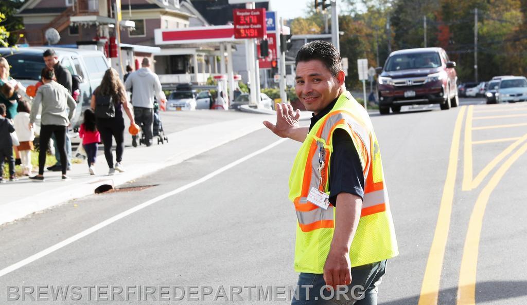 Photo #21
Firefighter Adoni Salgueru helping Fire Police with traffic