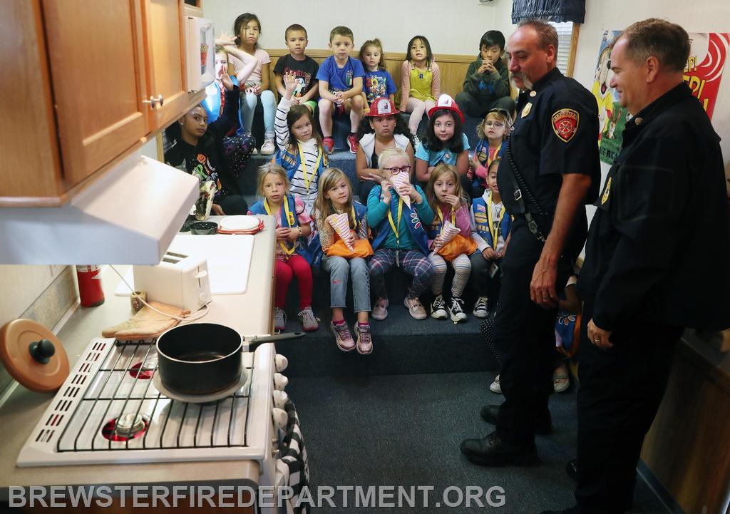 Photo #17
In the kitchen with Fireman Ken and Fireman Tom Lannon teaching safety