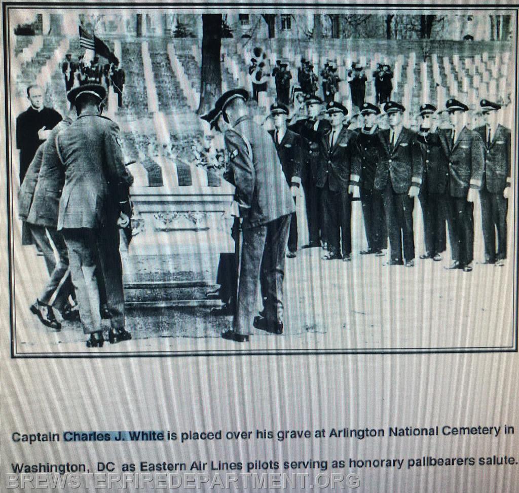 Photo # 7
Captain White is buried at Arlington Cemetery as Eastern Airline pilots salute him.